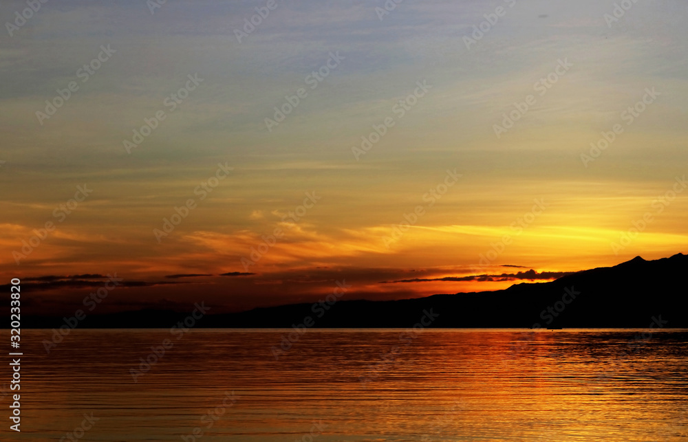 Minimalist Seascape Photography,golden sunset in a tropical island