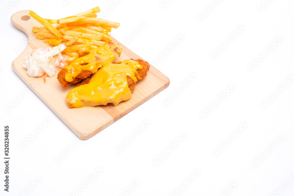 A copy space picture of cheesy chicken breast set with fries and coleslaw insight A copy space picture of cheesy chicken breast set with fries and coleslaw insight