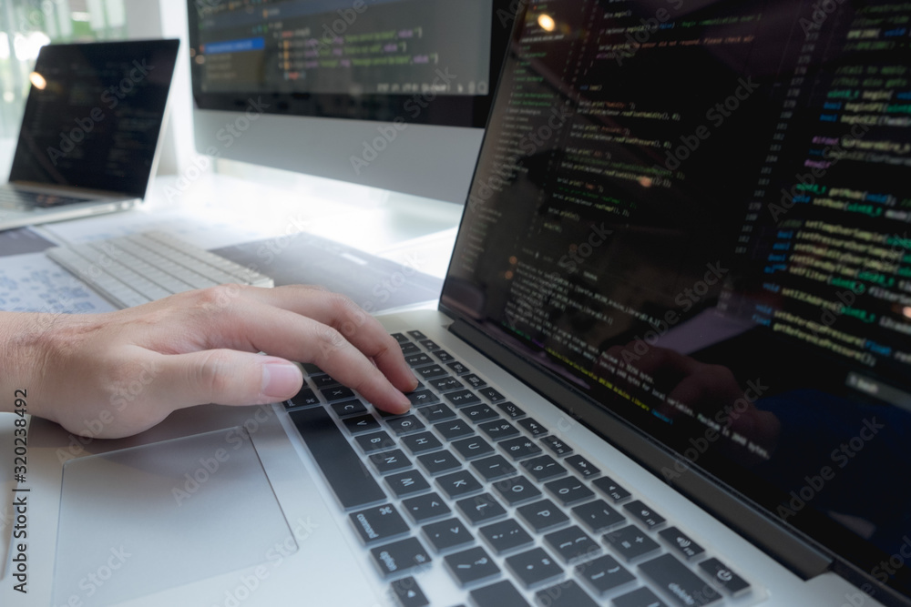 Programmers work on the development of coding and coding technology on white desks and website design, software, data processing companies, servers. Programmers work on the development of coding and coding technology on white desks and website design, software, data processing companies, servers.