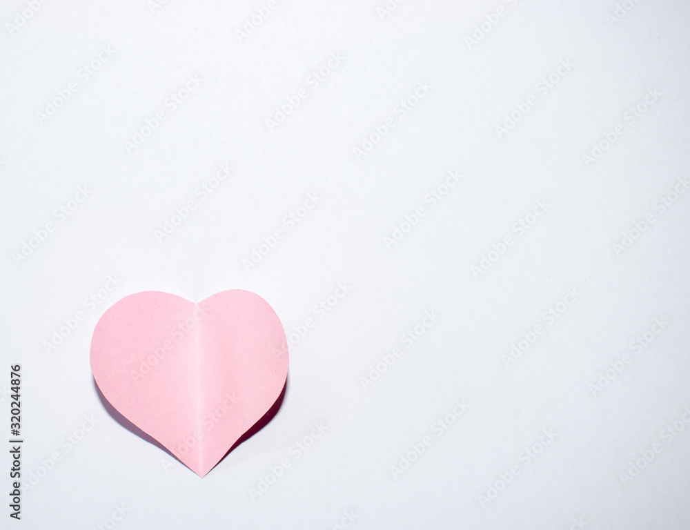 Pink paper heart with white background