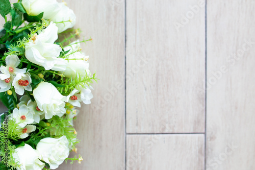 Flower bouquet on white wooden floor background with copy space. © nipol