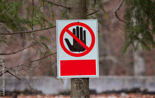 no trespassing sign on a tree. access forbidden