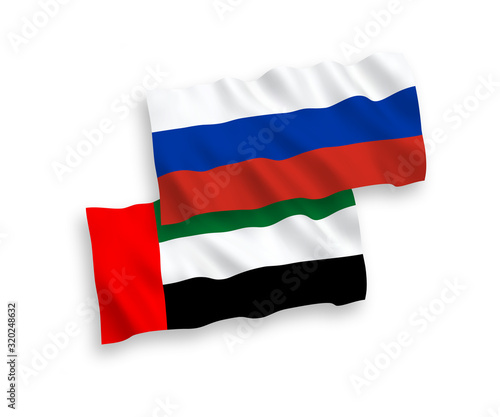 Flags of United Arab Emirates and Russia on a white background