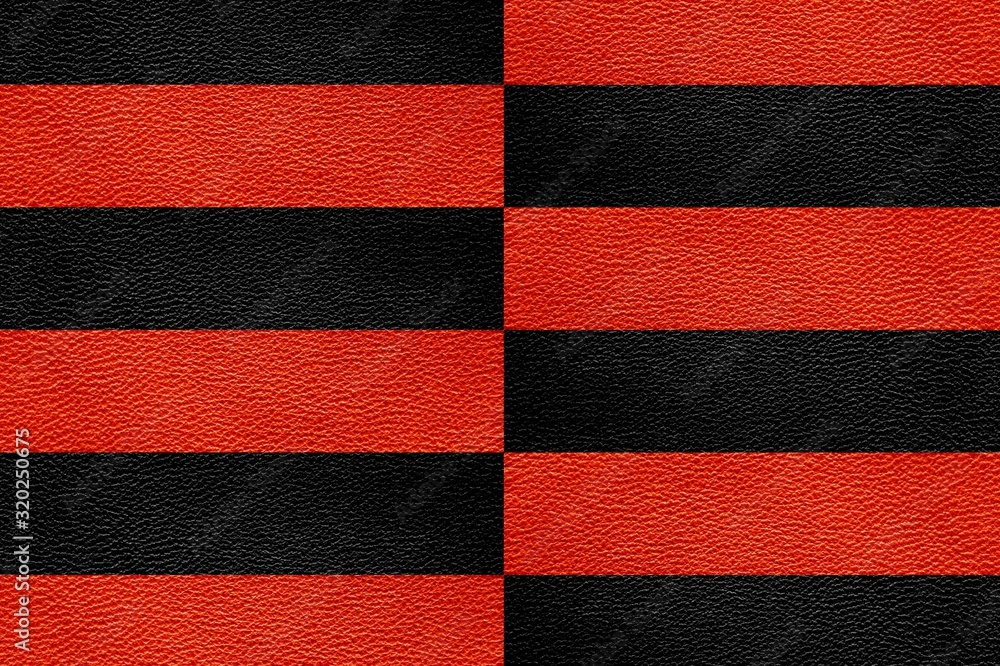 Fototapeta premium Texture of genuine leather. Black and red background.