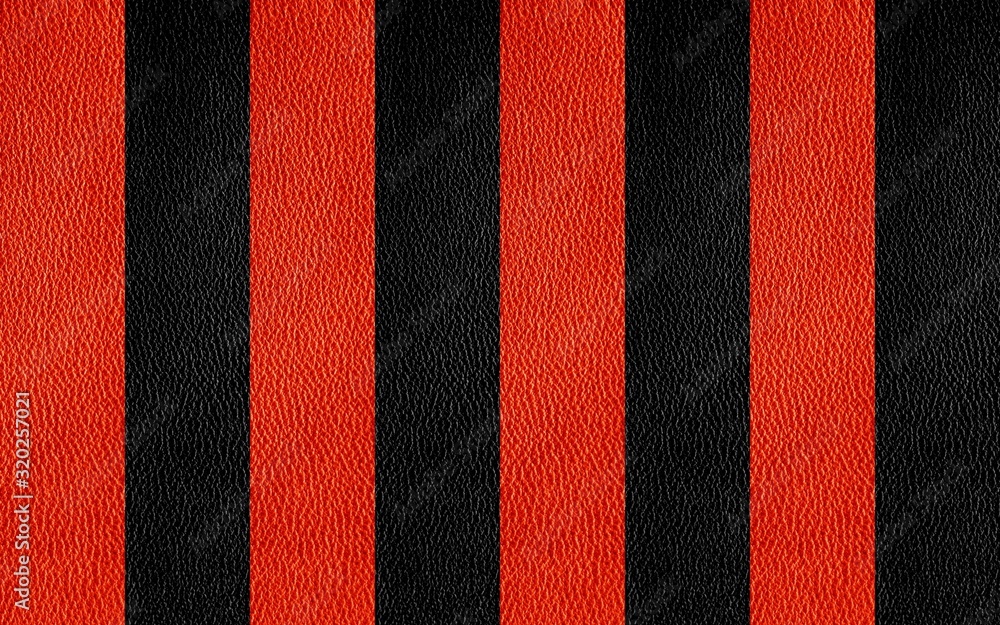 Fototapeta premium Texture of genuine leather. Black and red background.