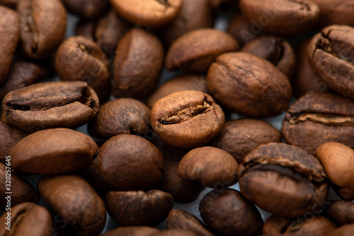 Coffee beans close-up background. Fresh roasted