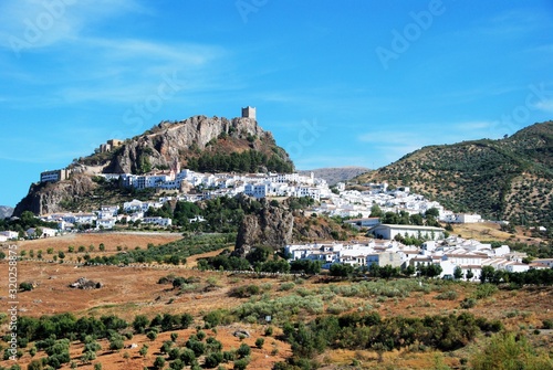 View of the town with a castle on top of the hill, Zahara de la Sierra, Spain.