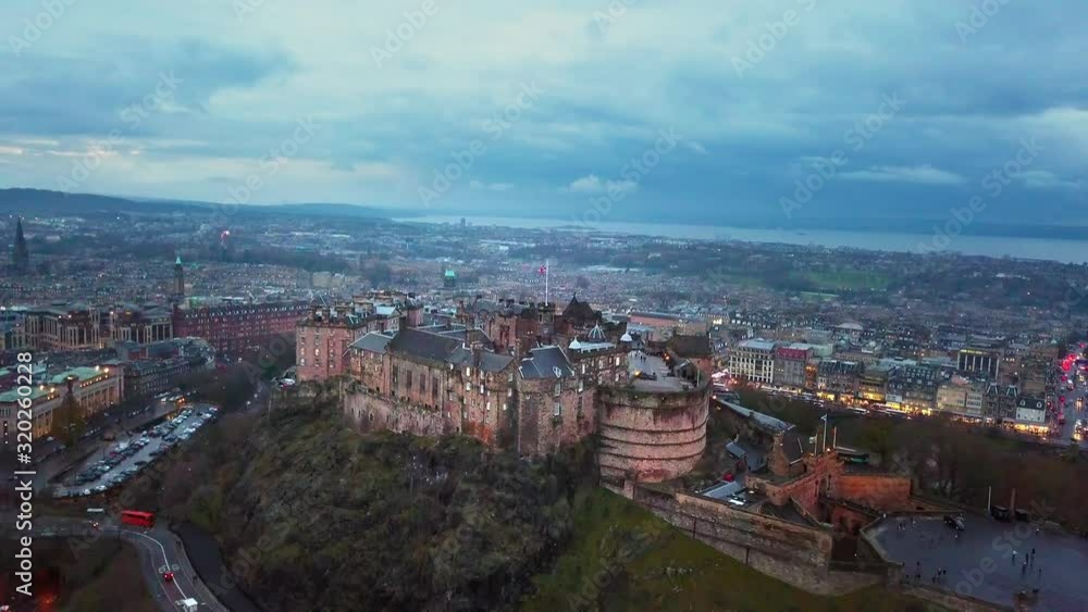 Epic aerial shot of Edinburgh Castle in Scotland. This is the castle that originally inspired J.K. Rowling to create Hogwarts. 4K 29fps Epic aerial shot of Edinburgh Castle in Scotland. This is the castle that originally inspired J.K. Rowling to create Hogwarts. 4K 29fps