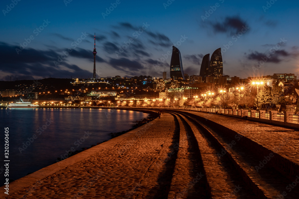 Night view of Baku with the Flame Towers skyscrapers