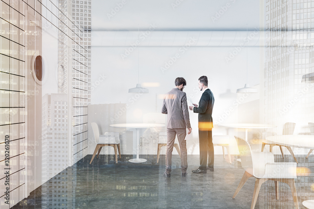 Business people talking in white restaurant