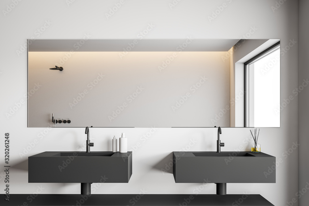Minimalistic white bathroom with double sink