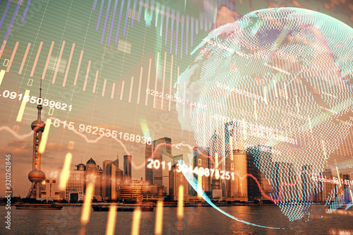 Forex graph on city view with skyscrapers background double exposure. Financial analysis concept.