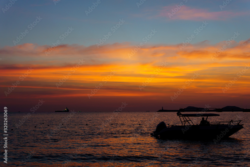Silhouette Sailboat In Sea Against Sky During Sunset
