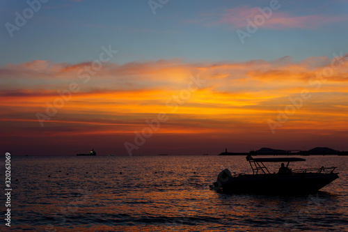 Silhouette Sailboat In Sea Against Sky During Sunset © BigBlues
