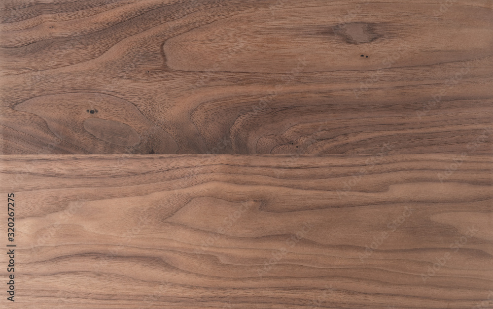 Texture of sanded raw black walnut wood without finish Texture of sanded raw black walnut wood without finish