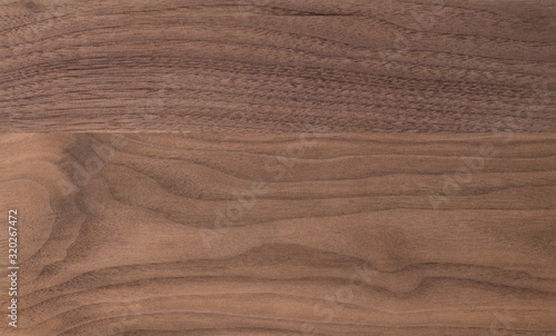 Texture of sanded raw black walnut wood without finish