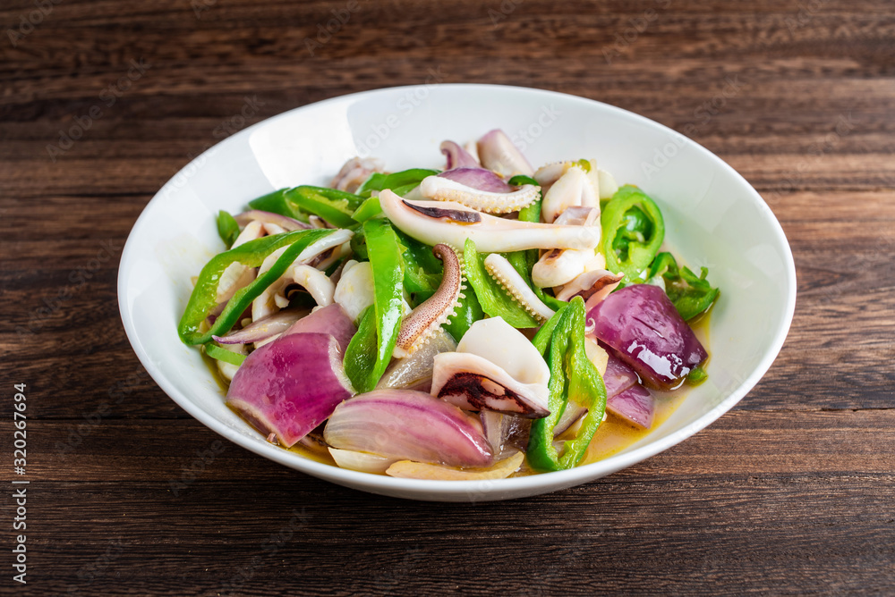 Chinese regular dish fried squid with onion and green pepper Chinese regular dish fried squid with onion and green pepper