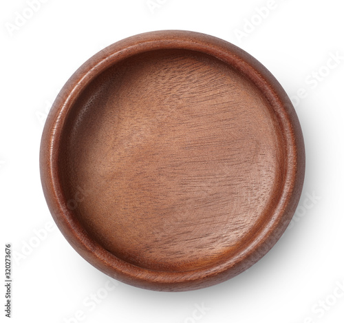Wooden plate isolated on white background. Top view.