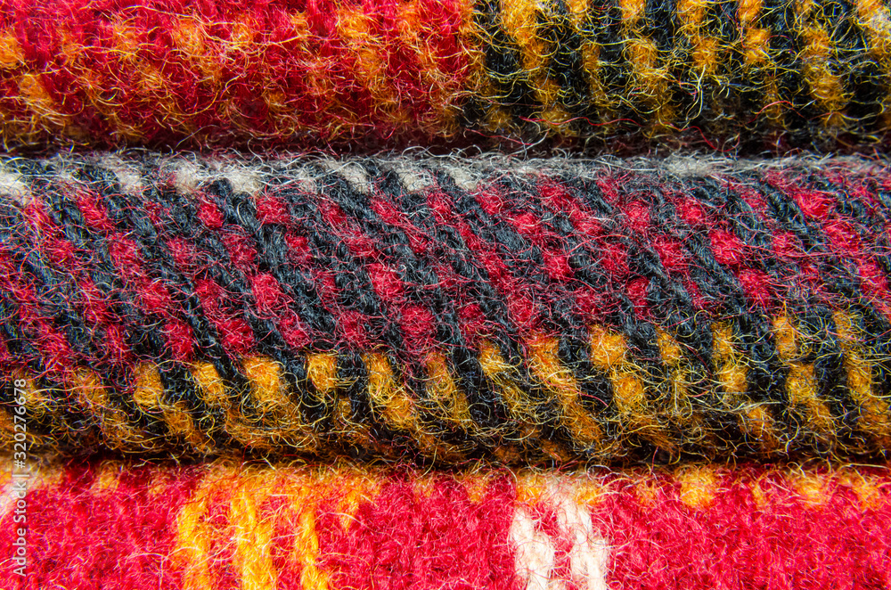 Stack of wool checkered blankets Stack of wool checkered blankets