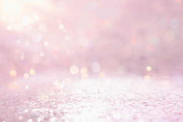 silver and pink glitter vintage lights background. defocused