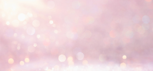silver and pink glitter vintage lights background. defocused