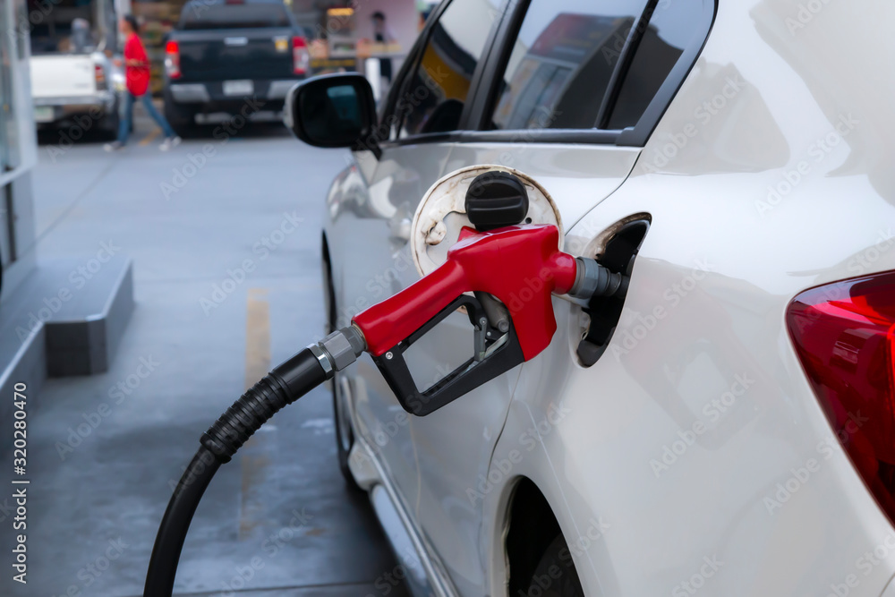 Car refueling on the petrol station.