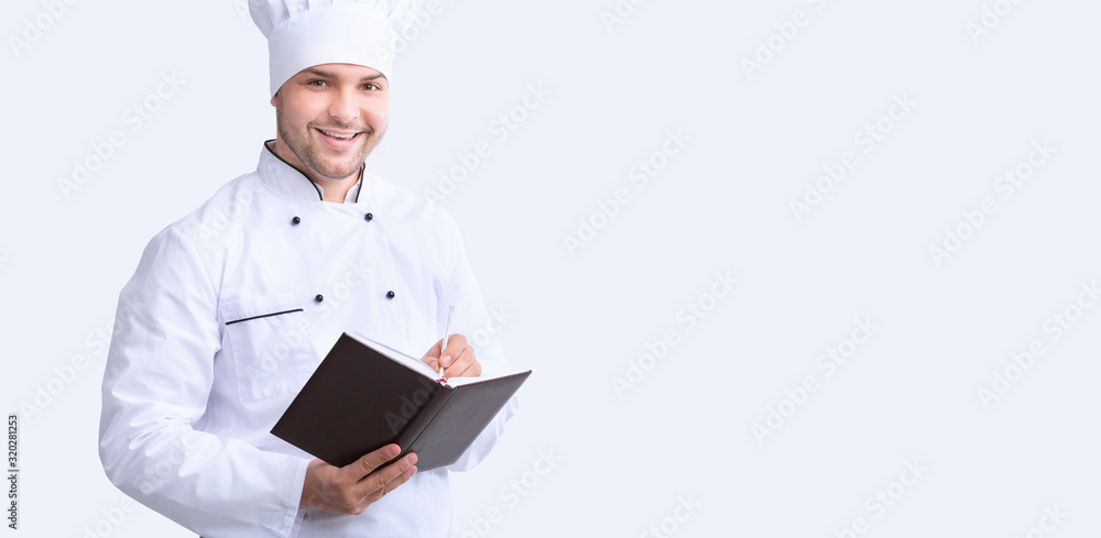 Chef Guy Writing Recipes Standing Over White Background, Panorama Chef Guy Writing Recipes Standing Over White Background, Panorama
