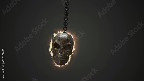 Burning skull rocks back and forth on the chain. Animation of swinging skull on chain.