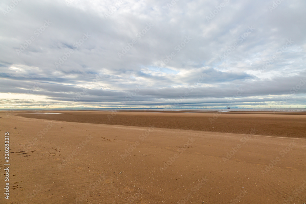 The vast sandy beach at Formby in Merseyside, at low tide