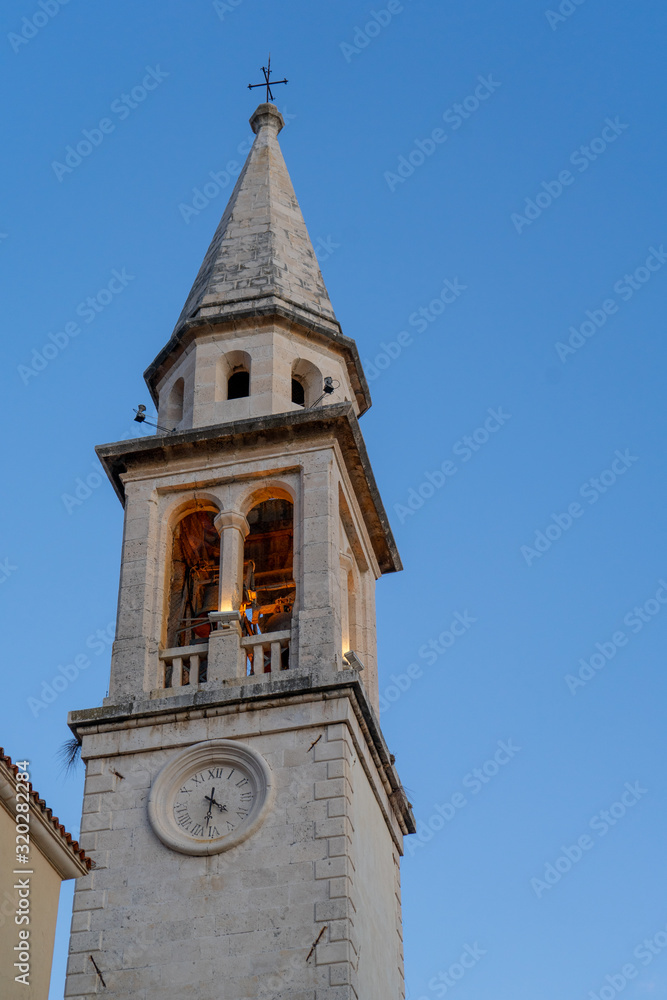 Old clock tower on a background of blue sky