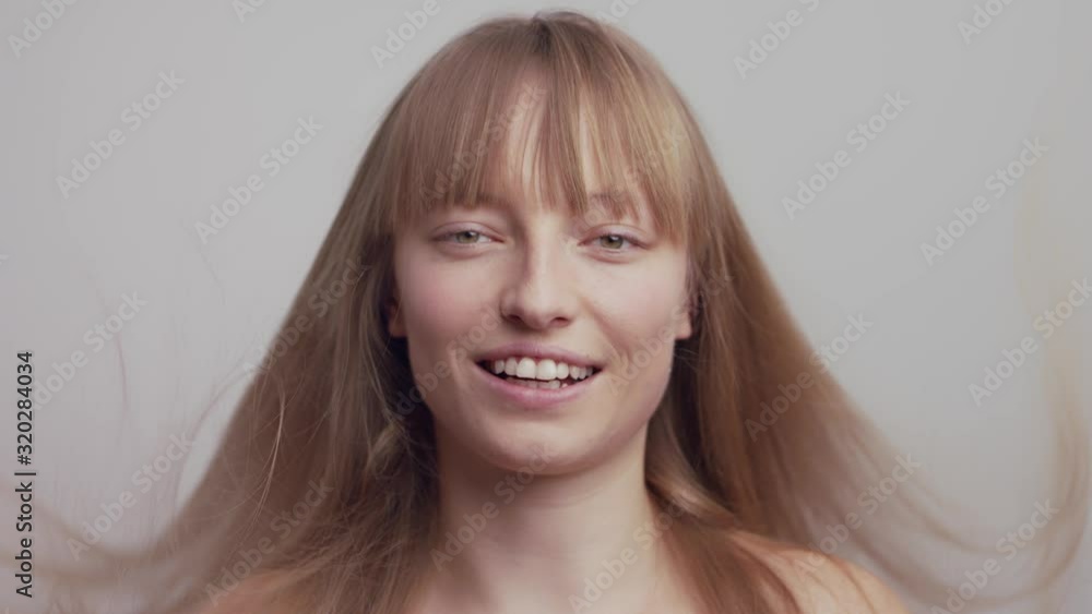 Slow Motion Young Woman Throwing Long Ginger Hair in Air Slow Motion Young Woman Throwing Long Ginger Hair in Air