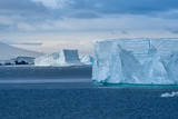 Navigating among enormous icebergs, including the world's largest recorded B-15, calved from the Ross Ice Shelf of Antarctica,