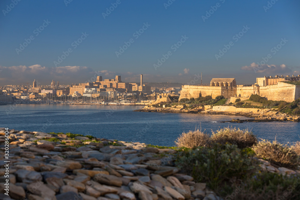 Fort Manoel on the Manoel island in Gzira at sunrise, Malta.