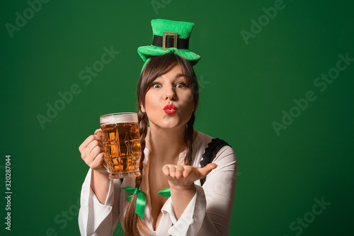 Funny young woman with beer...