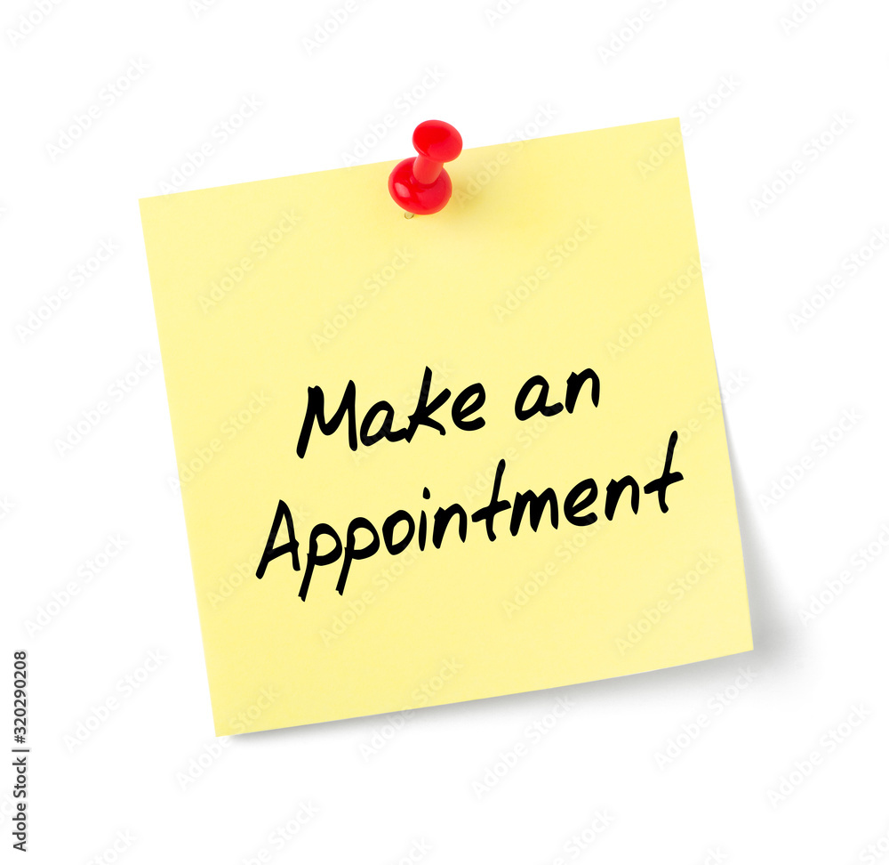 Yellow paper note with text Make an Appointment Yellow paper note with text Make an Appointment