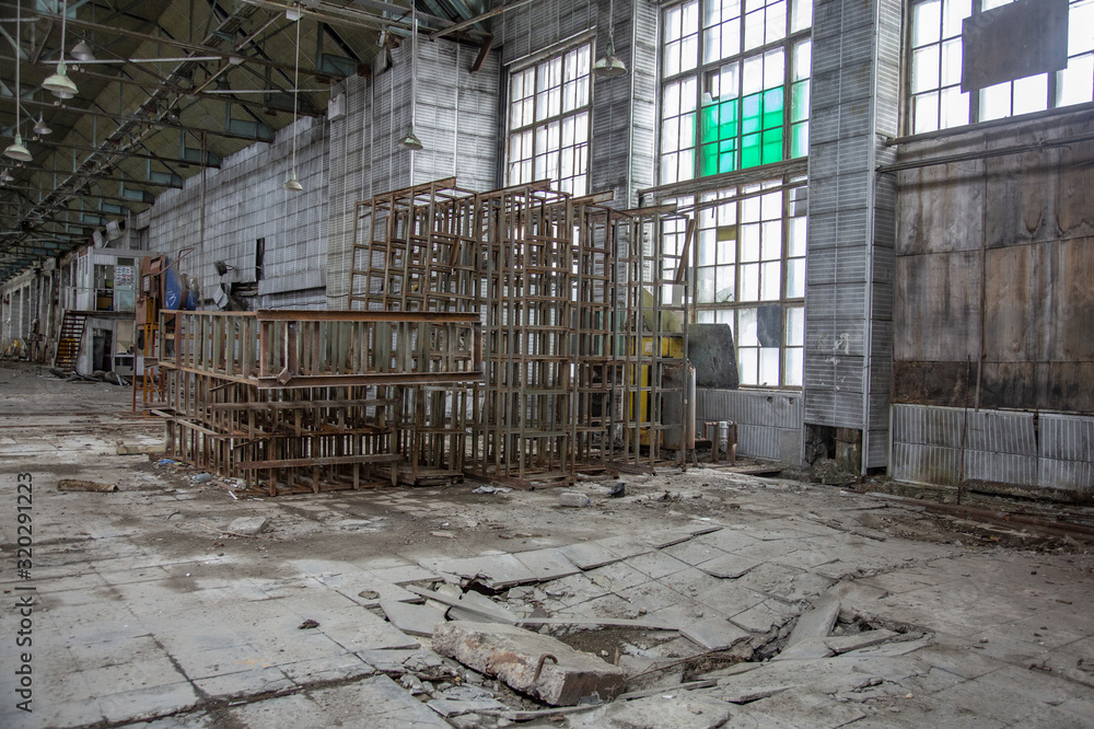 Interior of an abandoned industrial workshop. MIG Aircraft Building Plant in Moscow, Russia