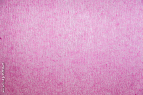Close up Pink stencil paper or Pink waxed sheet for background.