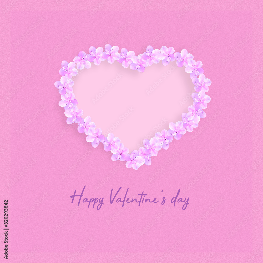 Heart made up of spring flowers on a pink background. Happy valentines day background.