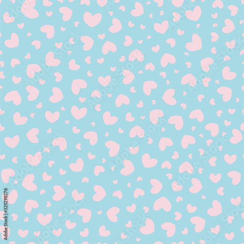 Pink hearts seamless repeat pattern for wrapping paper.Pink hearts on a blue background.Valentine's day pattern.