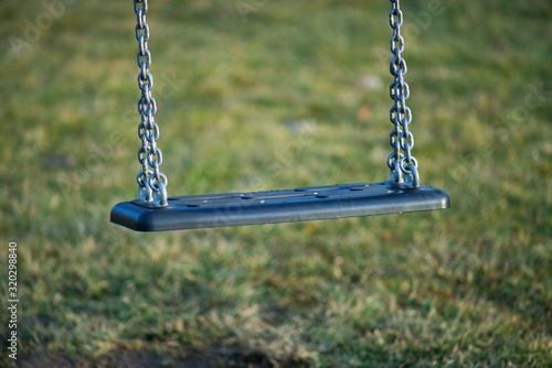 empty swing on playground