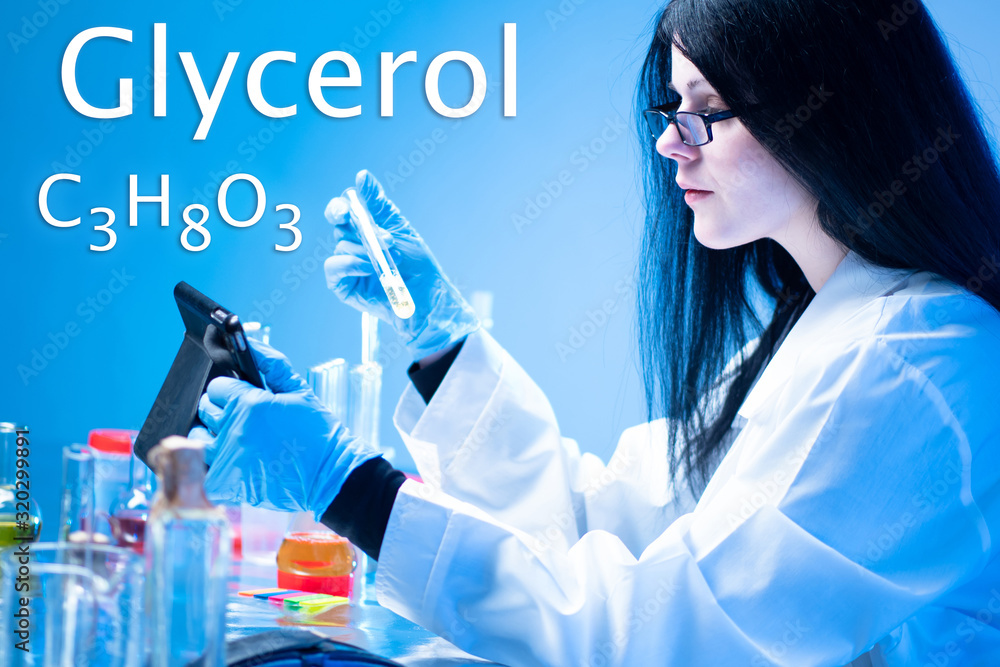 laboratory. A female takes notes during expertise. DNAdiagnostics