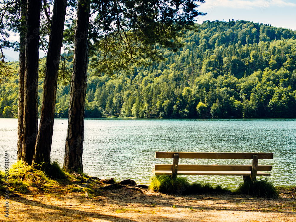 Bench near the picturesque mountain lake
