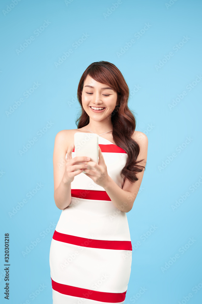young attractive asian woman to see a smart phone young attractive asian woman to see a smart phone