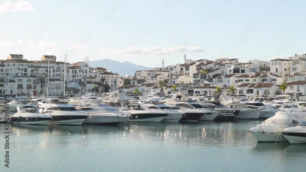 Luxury yachts in Puerto Banus, the marina of Marbella. Famous and Luxury location in Costa del Sol , Spain Luxury yachts in Puerto Banus, the marina of Marbella. Famous and Luxury location in Costa del Sol , Spain