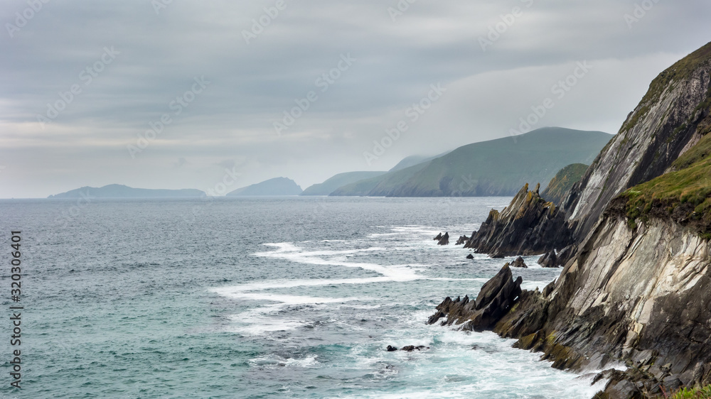 View of the Atlantic Ocean from Slea Head, Dunquin on the Dingle Peninsula in west County Kerry, Ireland. The Blasket Islands can be seen in the distance.