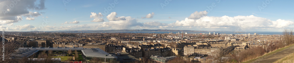 Panoramic view North from Calton Hill, Edinburgh, Scotland. The Firth of Forth can be seen in the far distance.