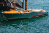 View of an elegant old fashioned wooden motor boat. A classic mahogany motorboat typical of Lake Como.