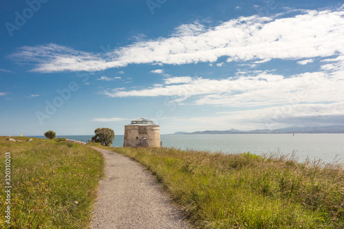 Canvas Print View of a Martello Tower and Dublin Bay at Red Rock, Sutton on Howth Head Peninsula near Dublin, Ireland