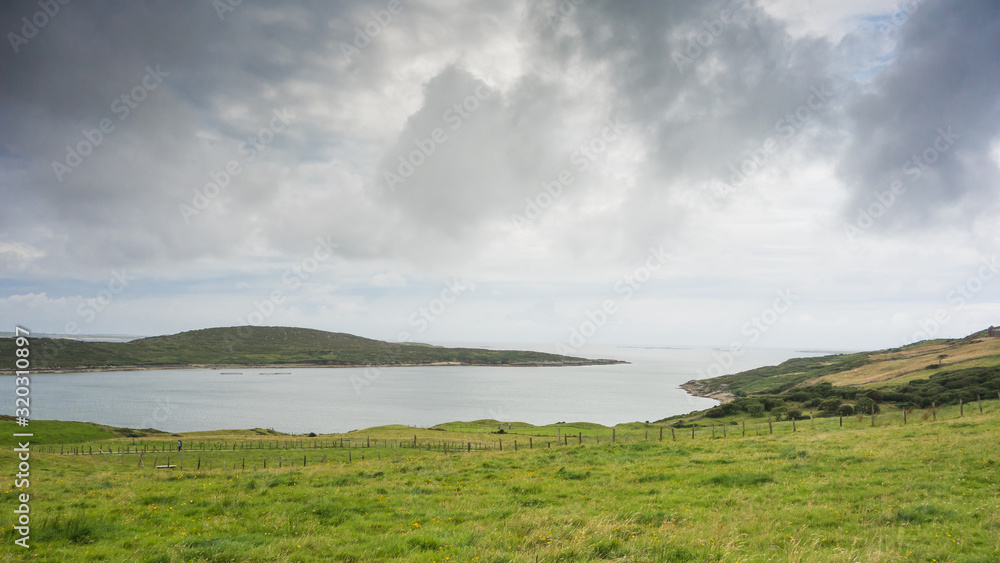 A view of Clifden Bay from the Beach Road, Clifden, Connemara, County Galway in the west of Ireland. A view of Clifden Bay from the Beach Road, Clifden, Connemara, County Galway in the west of Ireland.