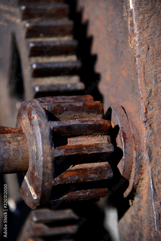 Rusty metal gears close up, part of old machinery Rusty metal gears close up, part of old machinery